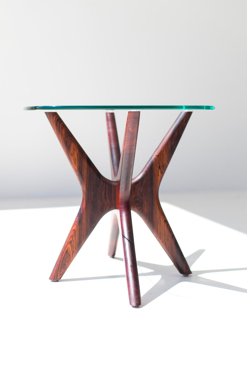 Detail of the glass top and walnut frame on the Jax side table