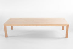 Modern luxury solid white oak dining table with a bleached matte finish