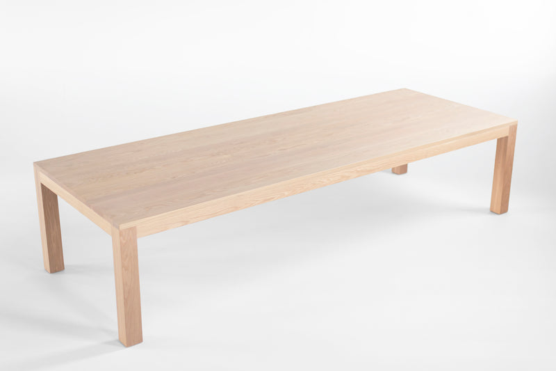 Modern luxury Christopher table styled with place settings and decor