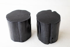 Tree stump side table styled outdoors on a patio