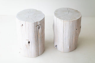 Whitewash stump side table shown at an angle