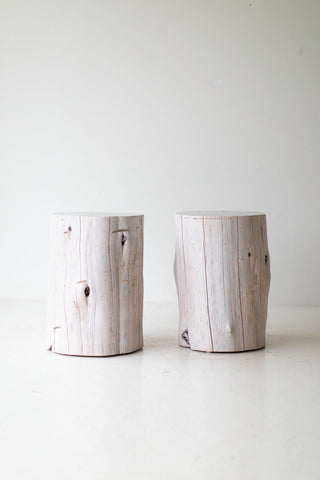 Whitewash stump side table in a modern living room