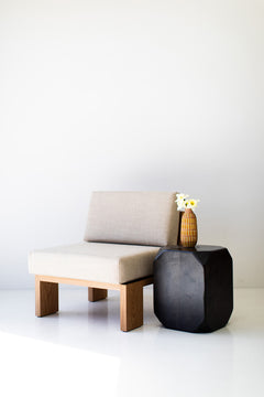 Side profile of the Dublin side table showing its angled, sculpted corners
