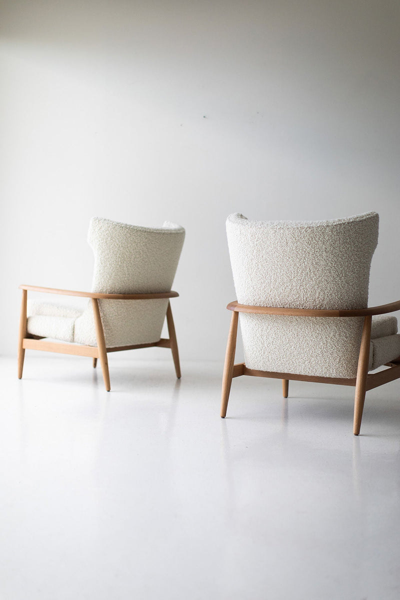 Side profile of the modern Peabody wing chair in boucle