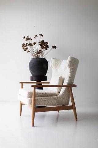 Close-up of the seat cushion and boucle upholstery