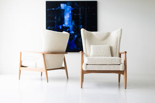 Modern luxury boucle wing chair styled in natural daylight