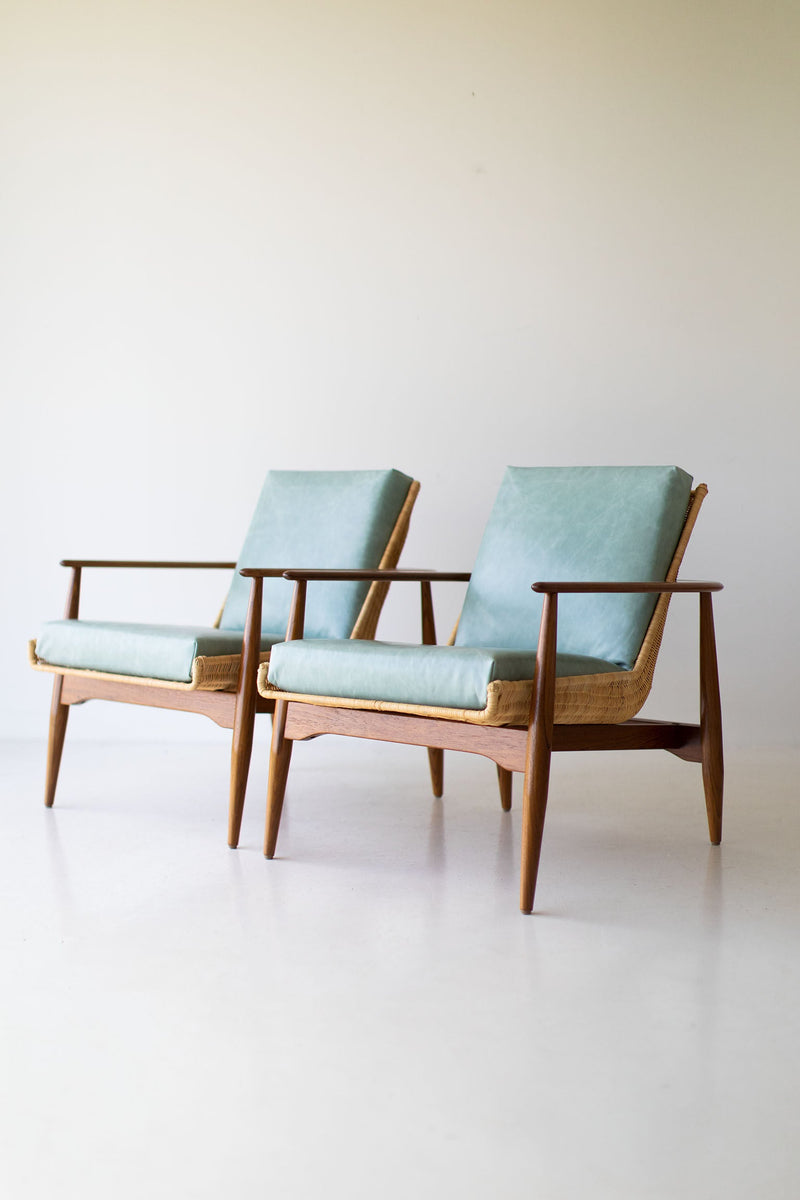 Lawrence Peabody 1806P wicker lounge chair in teak with a leather seat cushion
