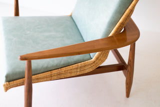 Peabody wicker lounge chair in teak and leather, detail of the hand-woven wicker