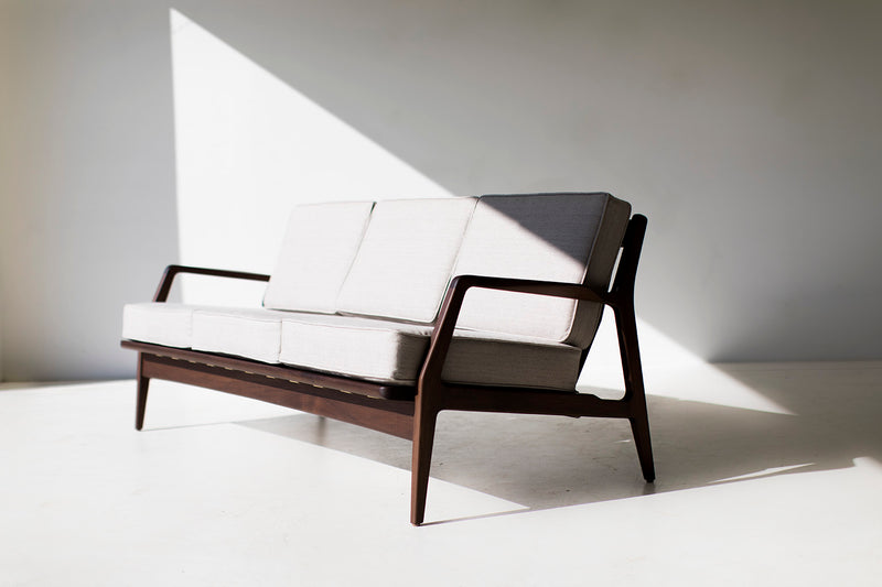 Close-up of the walnut frame joinery on the Peabody sofa
