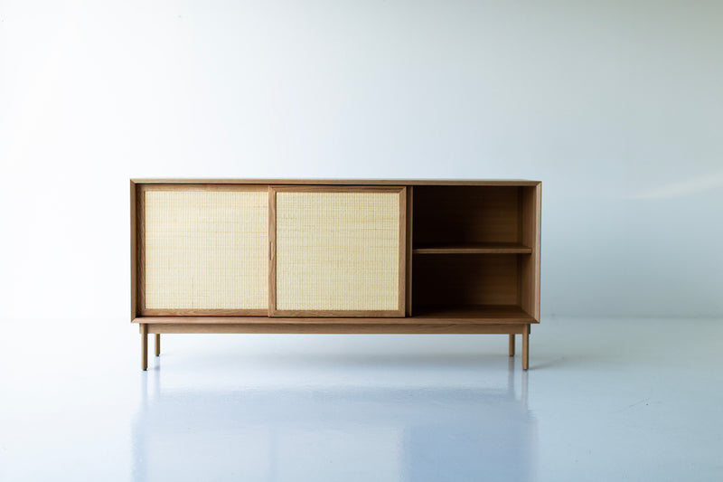 Angled view of the cabinet and its sliding cane doors