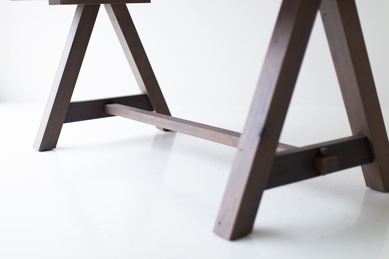 Liberty farm table styled in a dining room with chairs around it