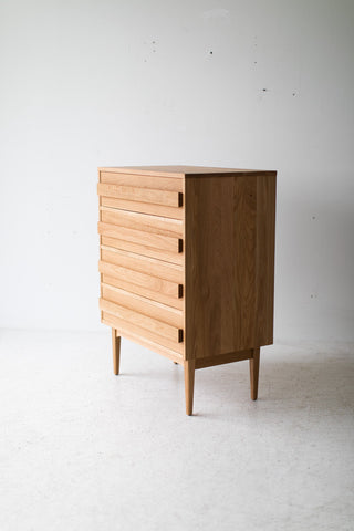 Hand-cut dovetail joinery on a white oak dresser drawer
