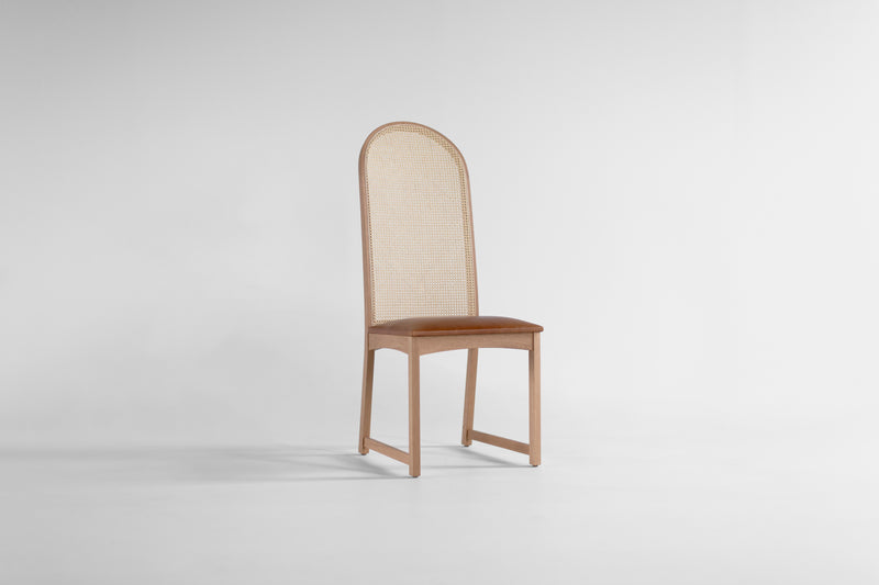 Modern luxury Milo Baughman highback arch dining side chair in oak and leather, front view