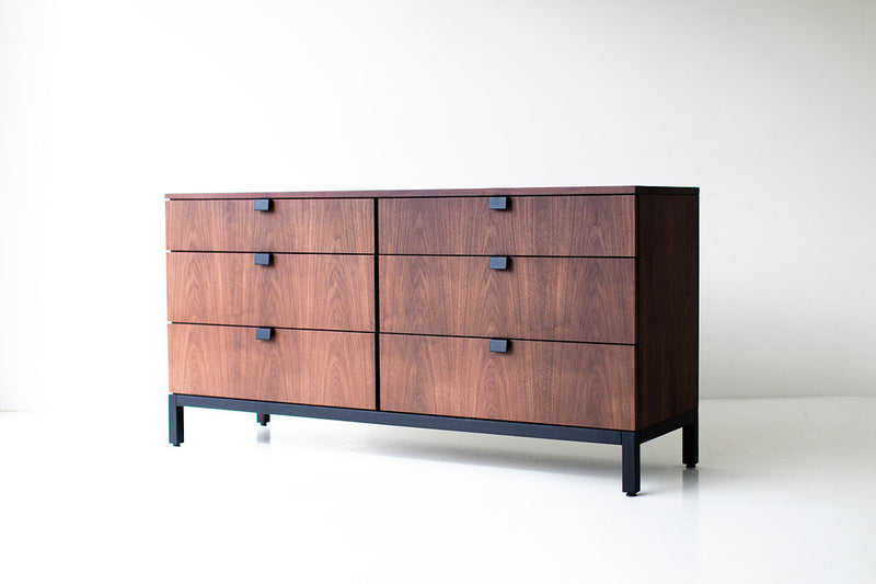 Close-up of the walnut veneer grain on the chest front