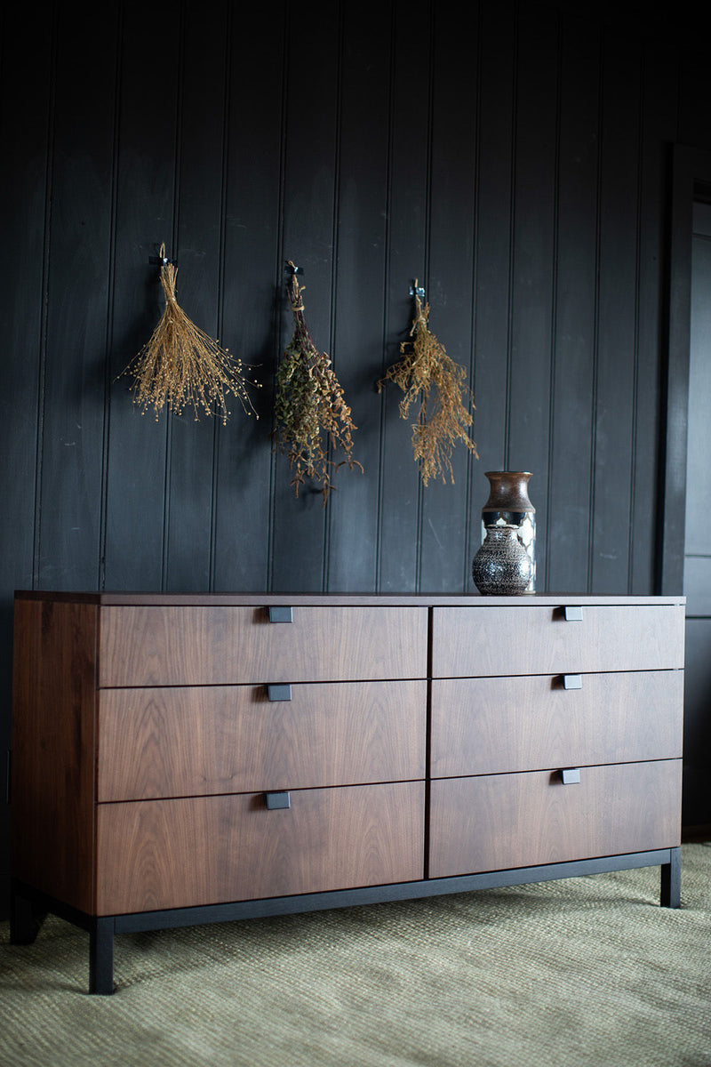 Full view of the Milo Baughman six drawer chest against a neutral backdrop