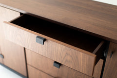 Milo Baughman buffet styled in a modern luxury dining room