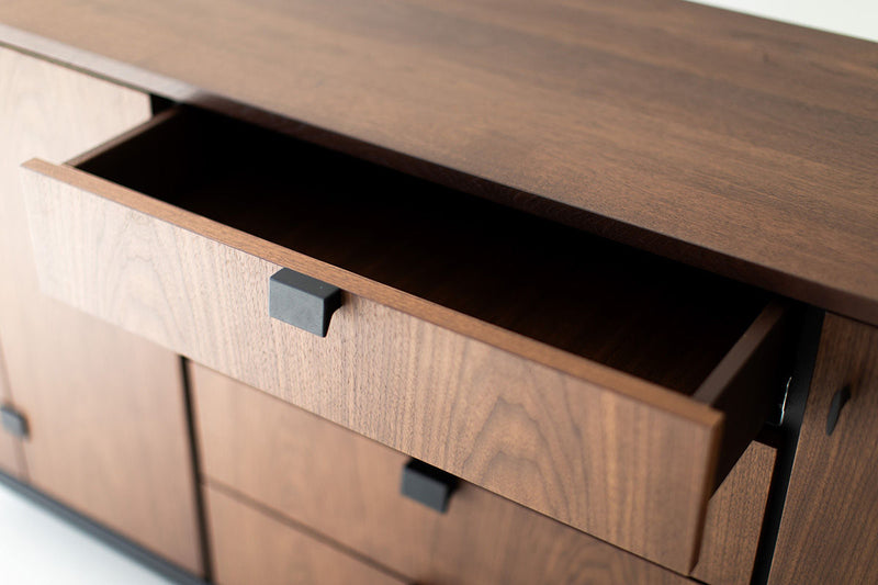Milo Baughman buffet styled in a modern luxury dining room