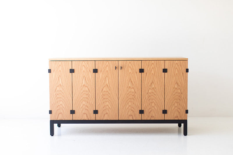 Modern luxury Milo Baughman credenza with flat door fronts and tapered legs, front view