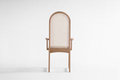 Detail of the oak wood grain and joinery on the arm chair frame