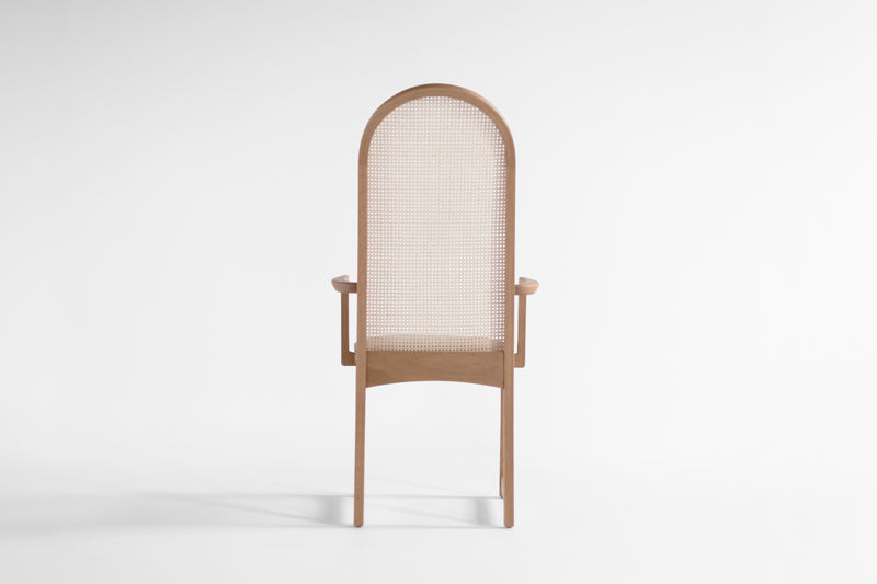 Detail of the oak wood grain and joinery on the arm chair frame