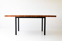 Angled view of the dining table highlighting the striped wood pattern