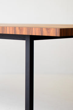 Detail of the matte black base beneath the striped top