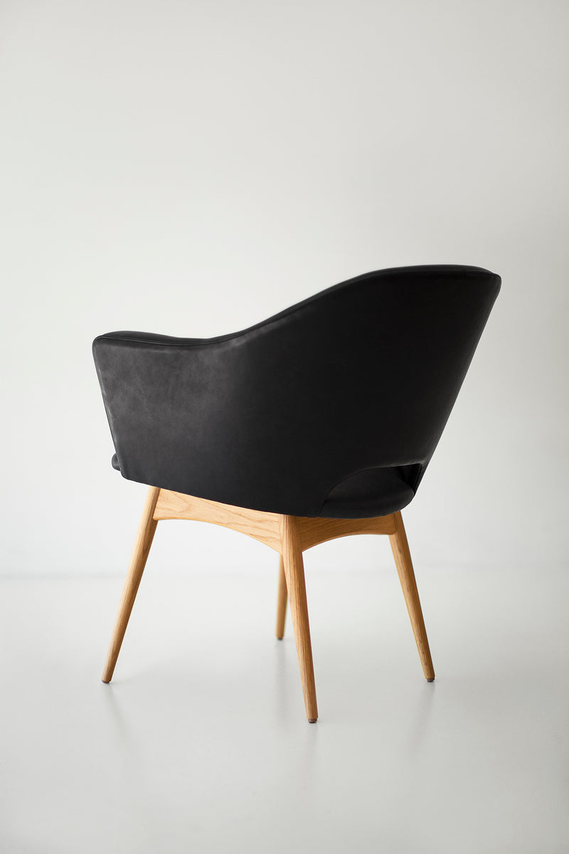 Close-up of the leather upholstery on the Scoop dining arm chair