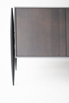 Modern luxury grey Cambre credenza styled in a modern living room