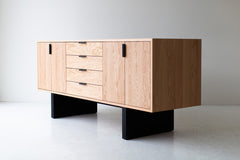 Close-up of a hand-welded iron drawer pull