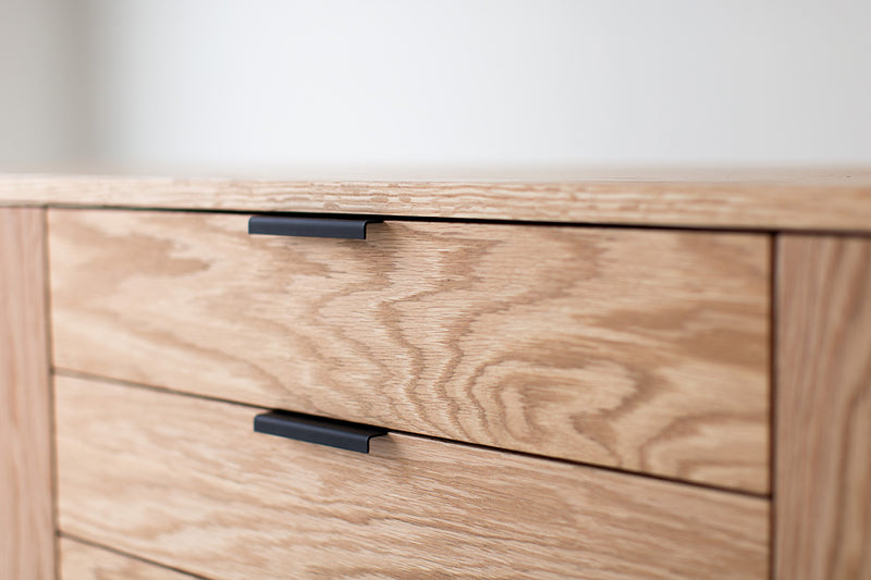 Modern luxury oak credenza styled as a media console