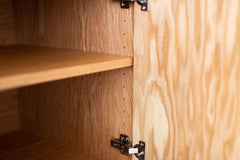 The oak top of the credenza seen from above