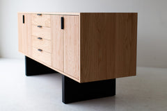 Modern luxury oak and iron credenza in a bright interior