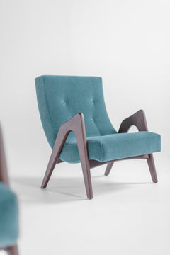 Close-up of high-grade black leather upholstery on the modern luxury Scoop lounge chair