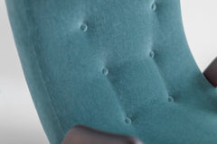Modern luxury Scoop lounge chair styled in a contemporary living room by Craft Associates®