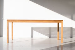 Modern luxury split panel dining table in solid white oak by Bertu Home, front view