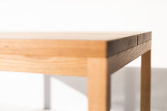 Detail of the matte commercial-grade finish on the luxury white oak top