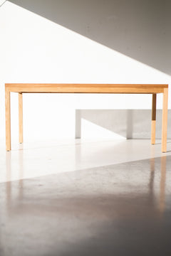 Modern luxury white oak dining table viewed from above