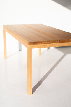 Close-up of the solid white oak legs and base