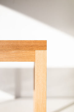 Angled detail of the handcrafted white oak tabletop joinery