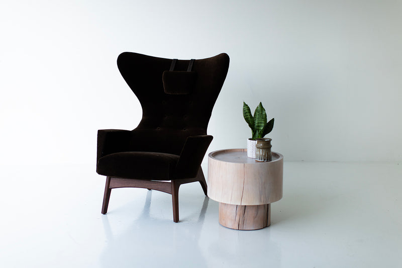 Side profile of The Breeze side table showing its rounded, organic silhouette