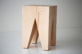 The Vega sculpted maple side table and stool in natural finish, Bertu Home