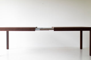 Overhead view of the walnut dining table surface