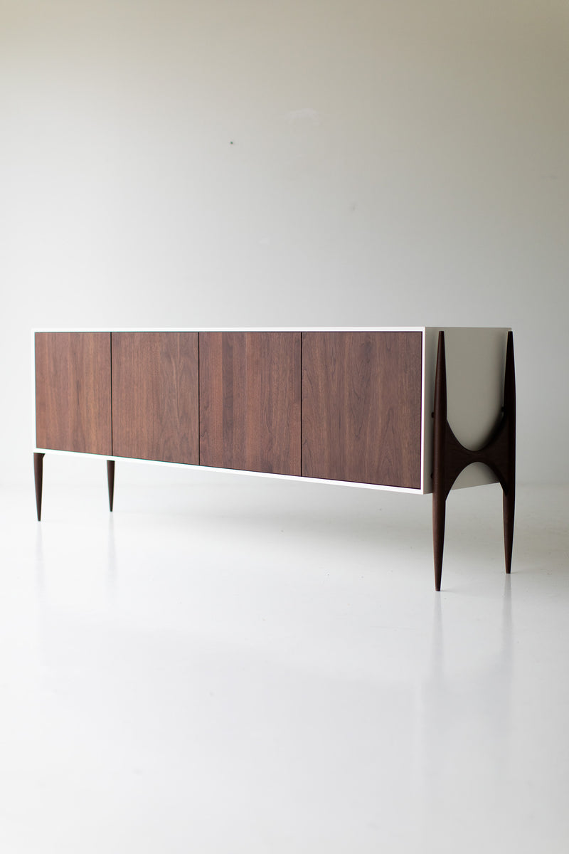 Modern luxury walnut Cambre credenza, side profile showing its fluid arched legs