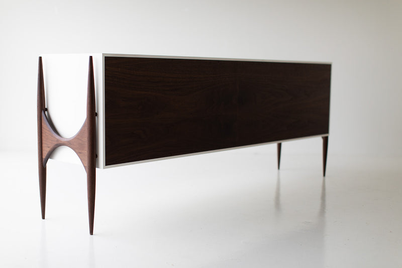 Front view of the modern luxury Cambre credenza's hand-lacquered maple frame in walnut