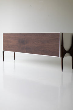 Close-up of the hand-lacquered finish on the modern luxury Cambre credenza frame