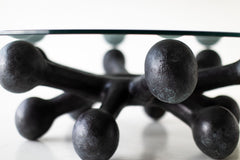 Close-up of the hand-welded bronze base on this coffee table