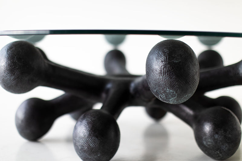 Close-up of the hand-welded bronze base on this coffee table
