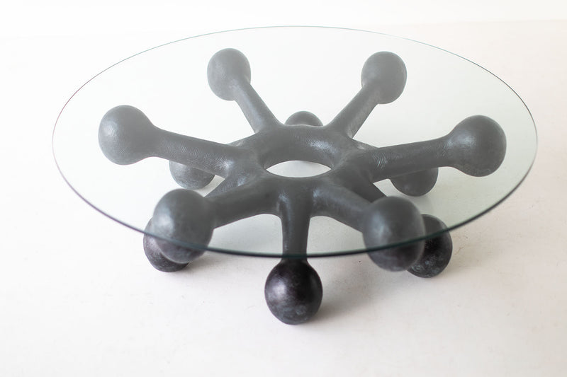 Modern luxury black bronze coffee table styled in a living room
