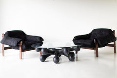Detail of the glass top and black bronze frame