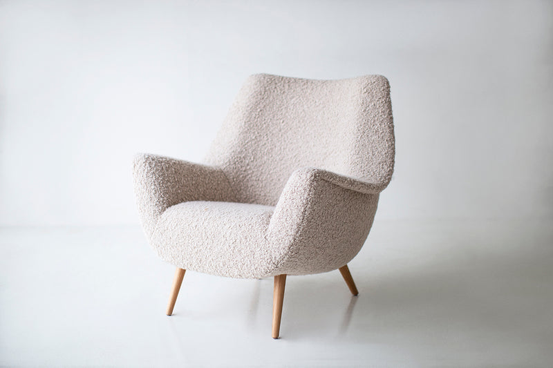 Modern Danish lounge chair styled in a luxury living room setting